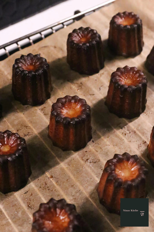 Canelés (oder Cannelés) - französische "Küchlein" mit Rum