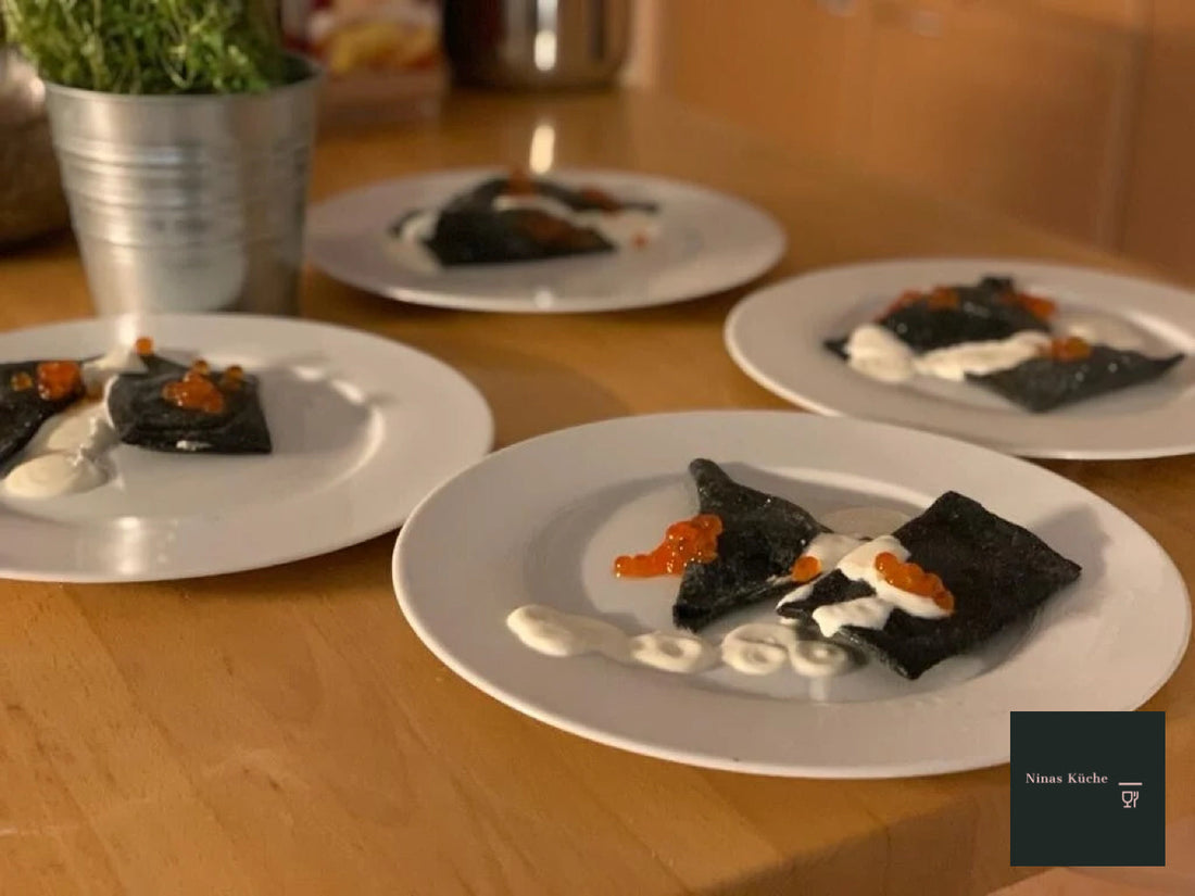Sepia-Ravioli mit Garnele und Forellenkaviar